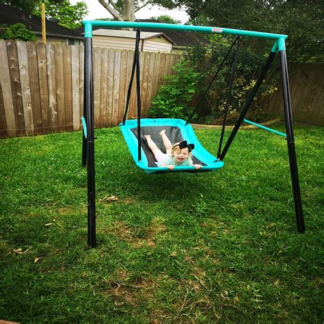 Elevate Your Backyard Fun with a Magic Carpet Swing Set